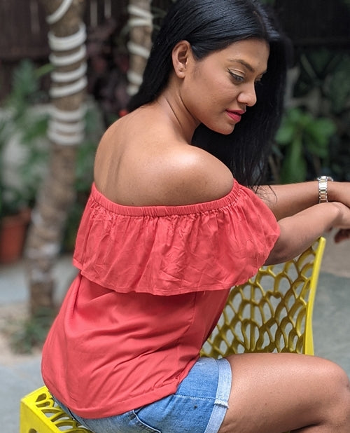 Woman in yellow, red, and green floral off-shoulder blouse posing near rose  bush photo – Free Apparel Image on Unsplash